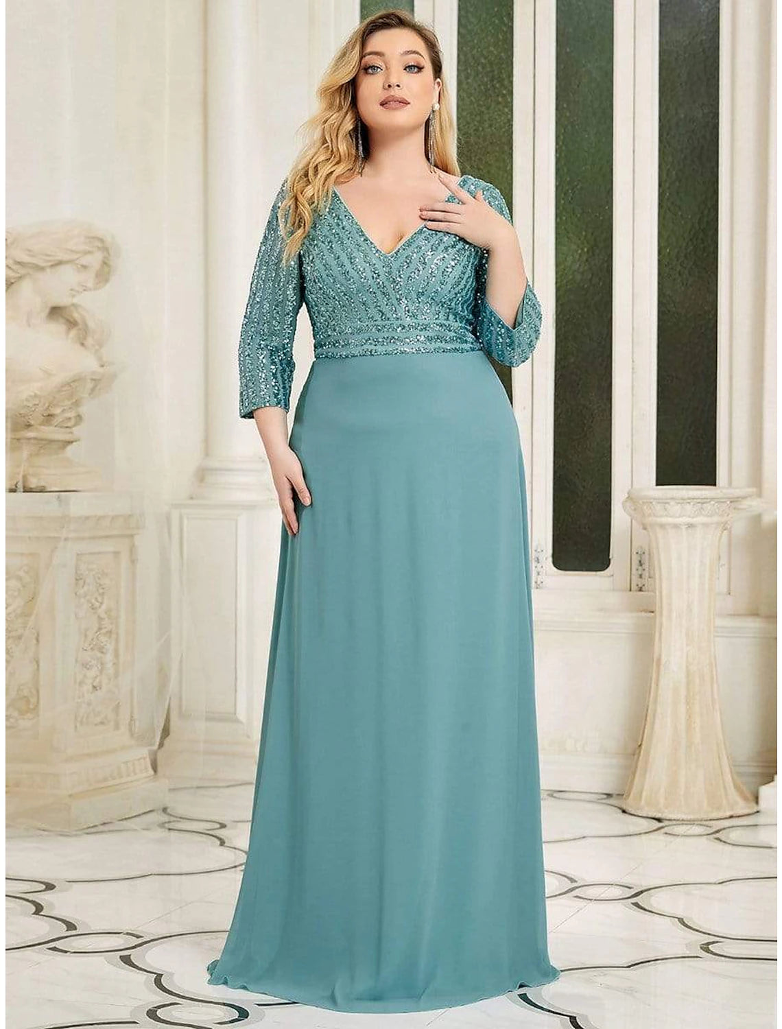 Elegant black A-line evening gown with V-neck and 3/4 sleeves.