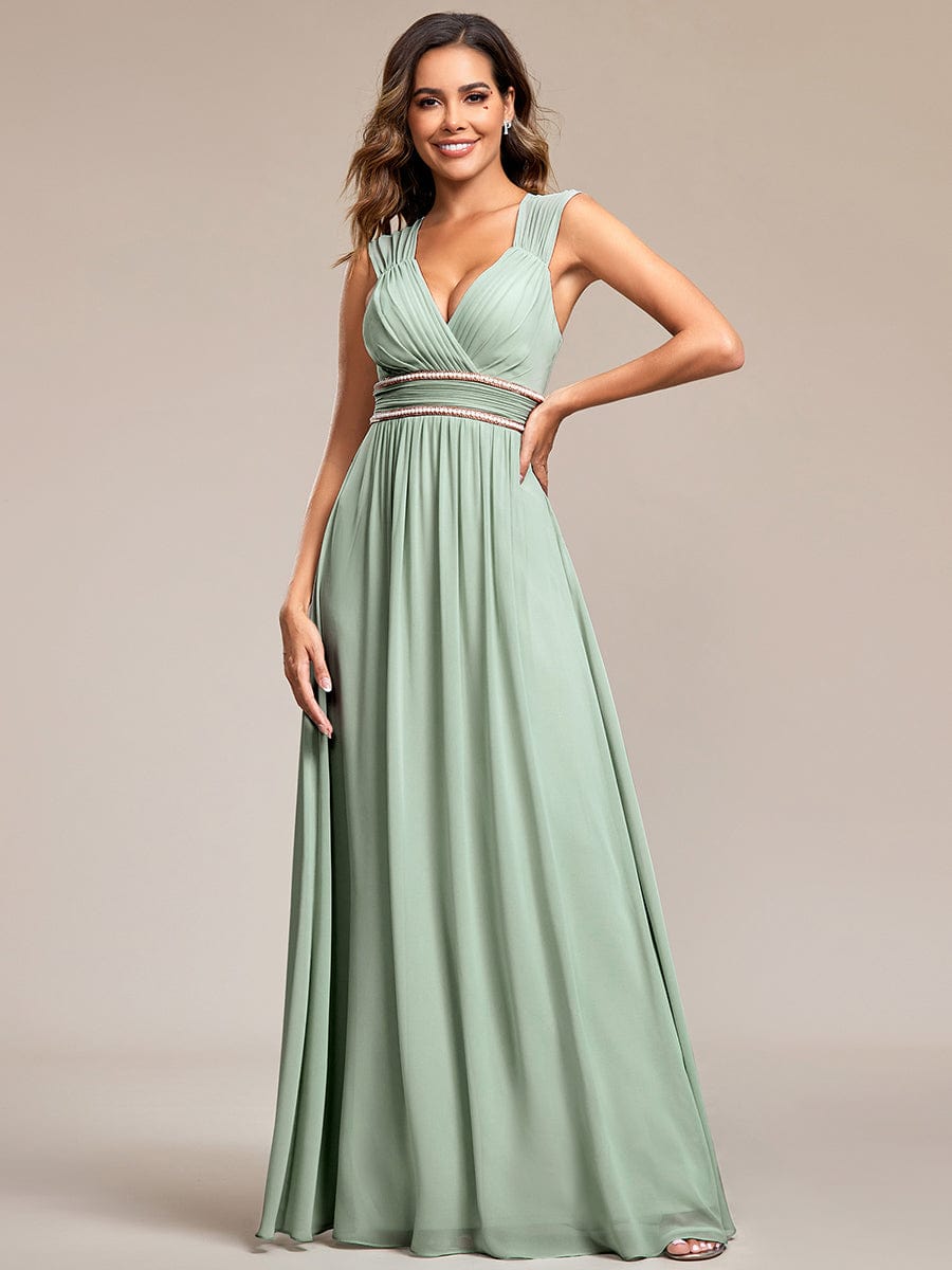 Magenta A-line V-neck chiffon evening dress with beaded belt.