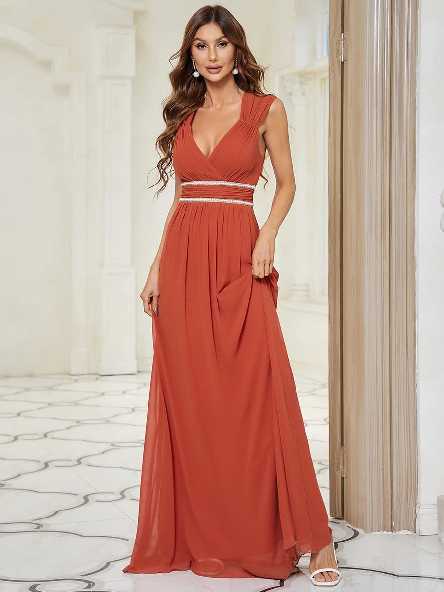 Blue A-line V-neck chiffon evening dress with beaded belt.