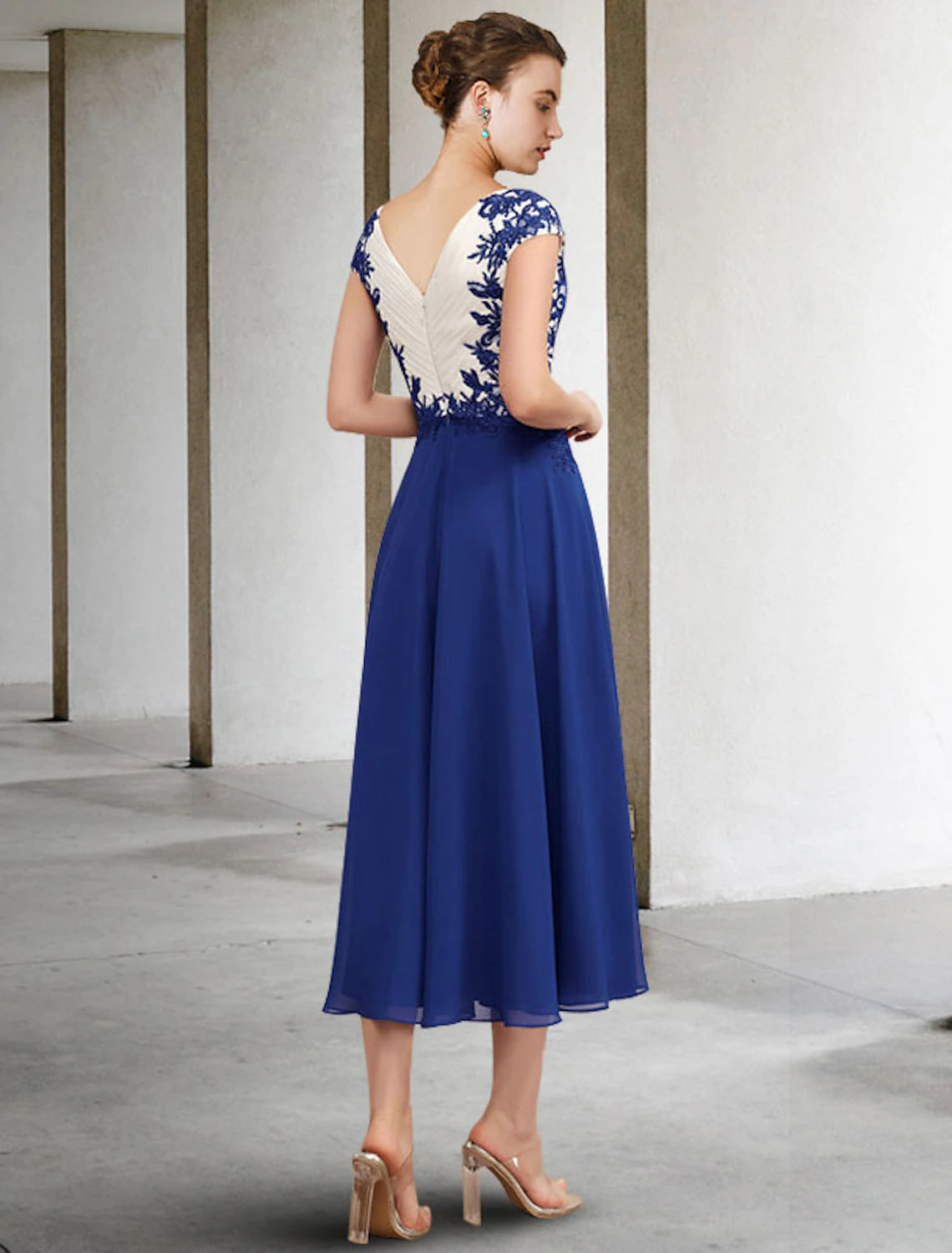 Side view of the Weitese A-line tea length dress, highlighting side-draped detail and cap sleeve.
