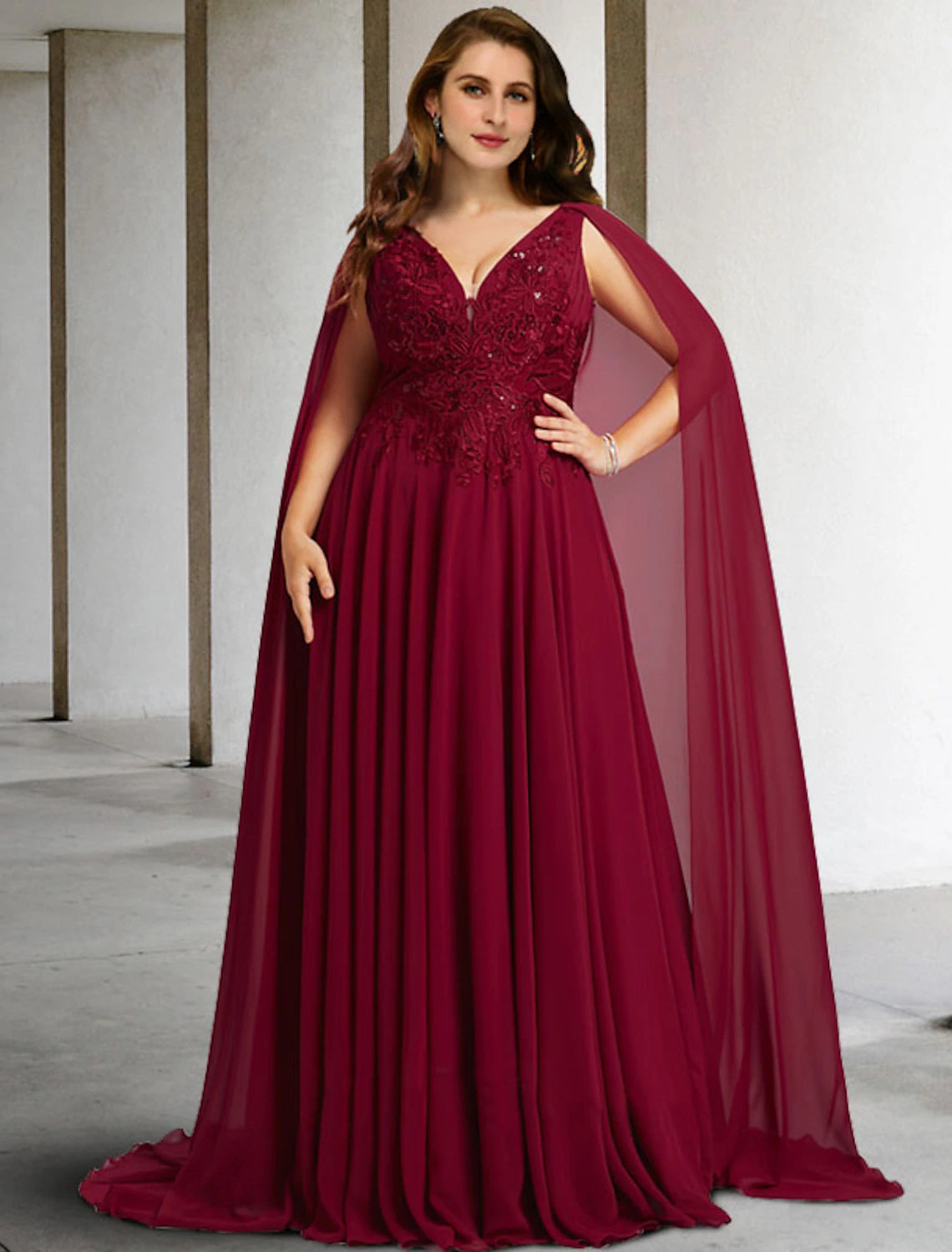 Elegant plus size A-line Mother of the Bride dress with V-neck and cap sleeves, front view.