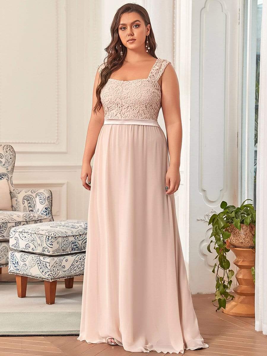 Close-up of the lace bodice and chiffon skirt of the blue dress.