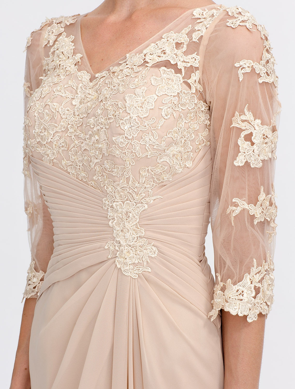 Woman in the sophisticated V-neck half sleeve Mother of the Bride gown.