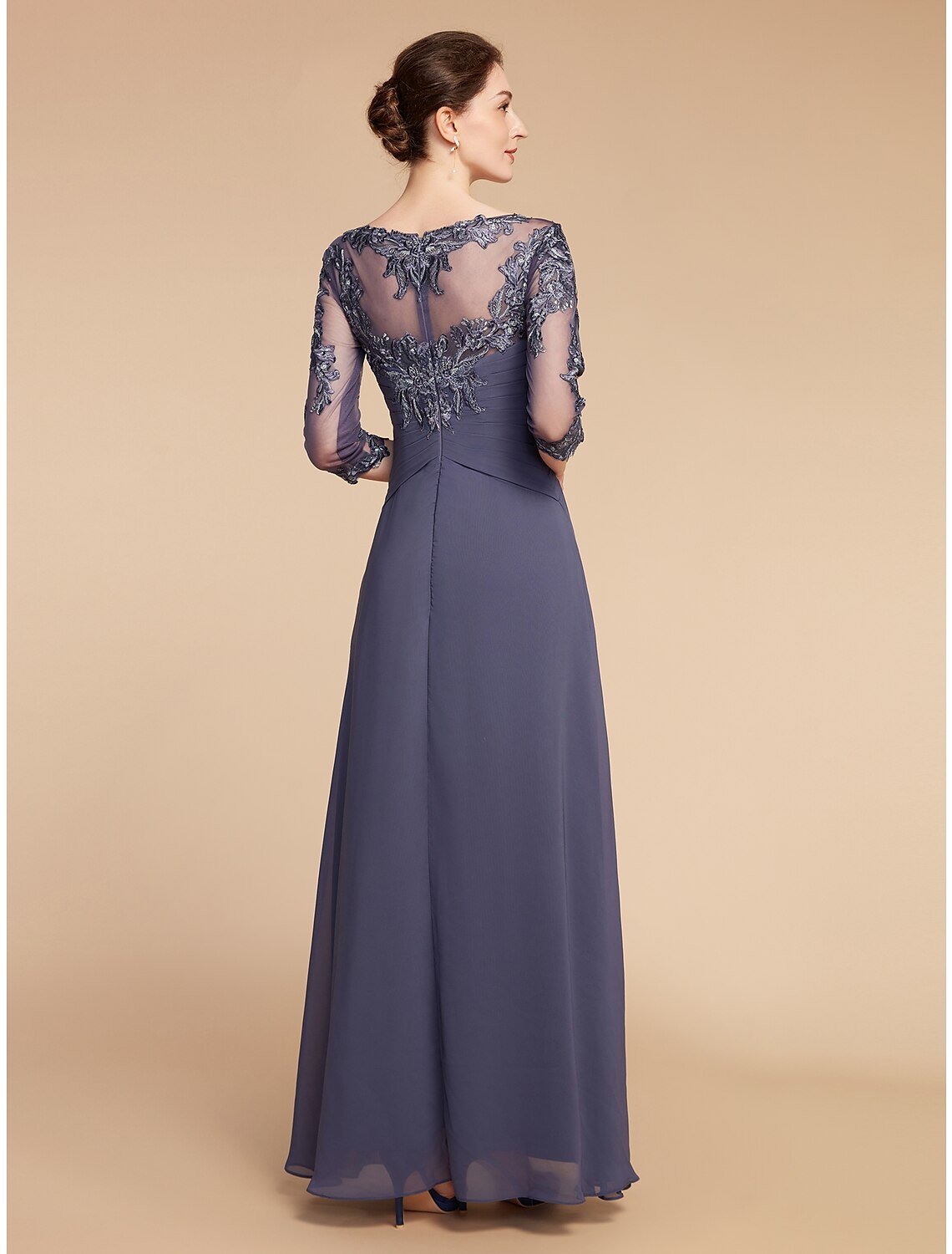 Back view of the A-line chiffon lace dress, showing appliques and floor-length design.
