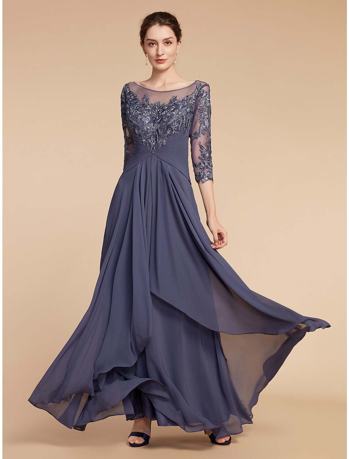 Side profile of the mother of the bride dress, highlighting the A-line silhouette and 3/4 sleeves.