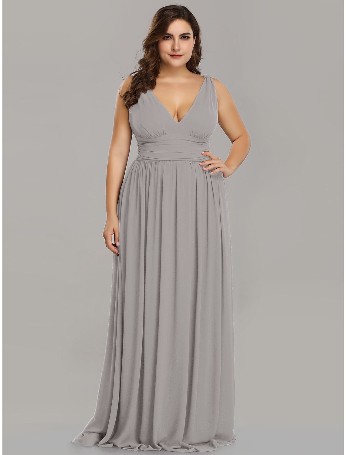 Model posing in the A-line V-neck chiffon gown, highlighting the flowy skirt.