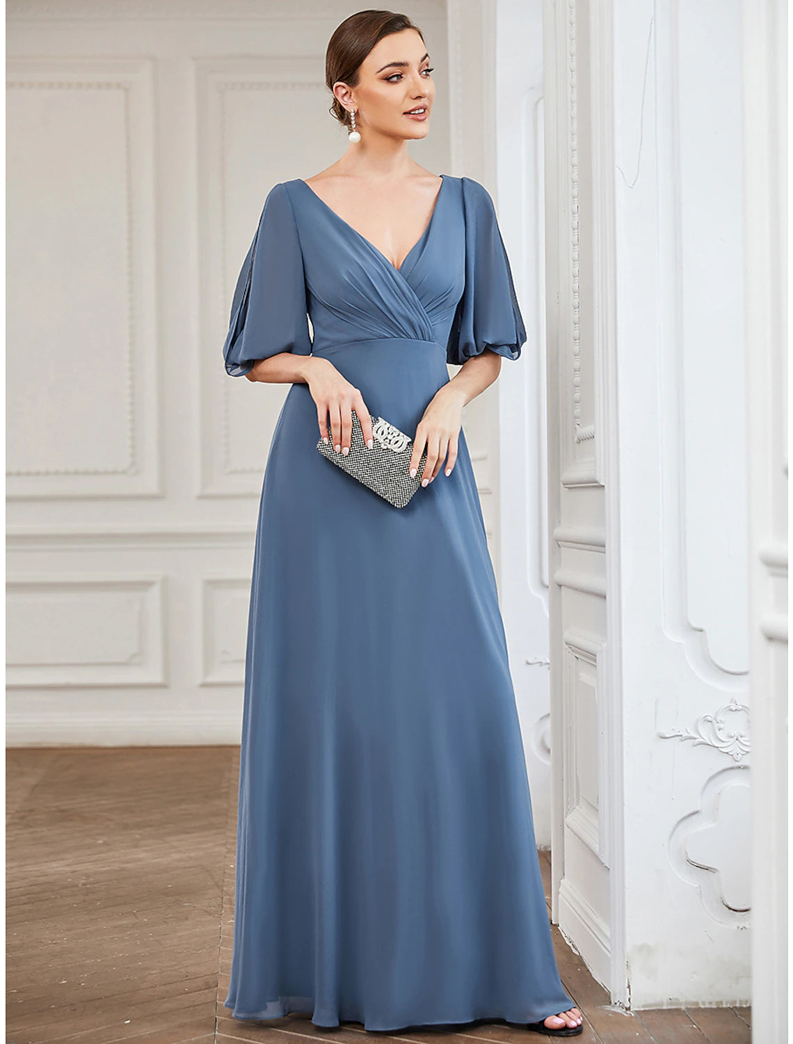Close-up of Weitese V-neck chiffon dress with pleated details.