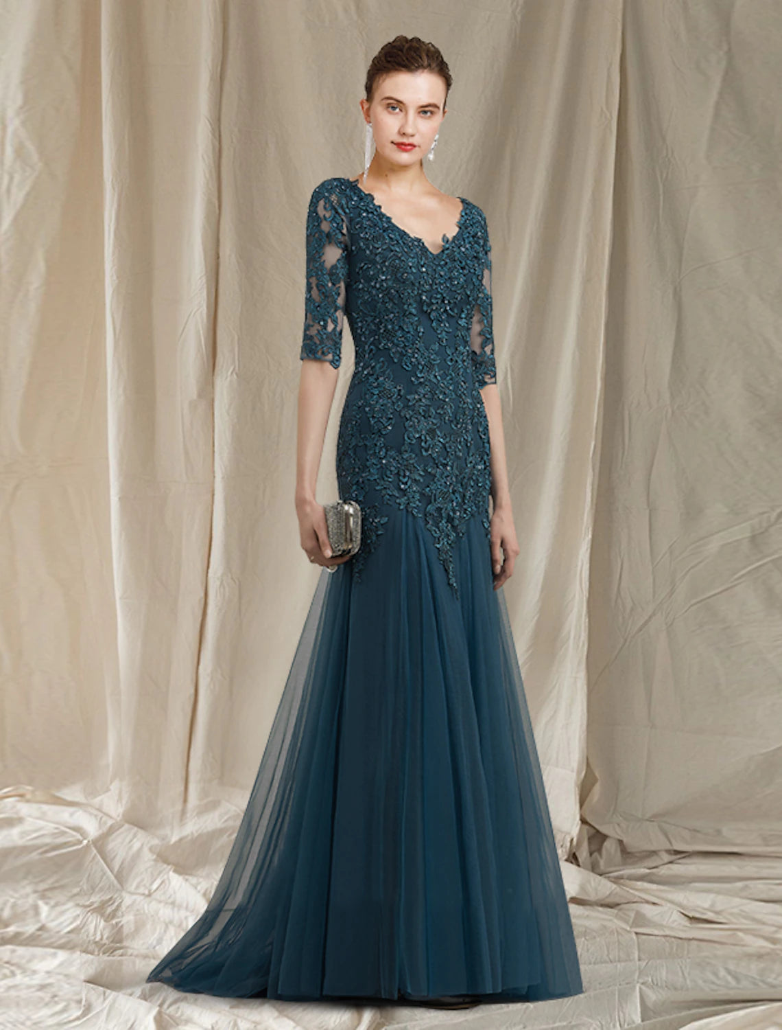Elegant A-Line Mother of the Bride dress with V-neck and half sleeves.