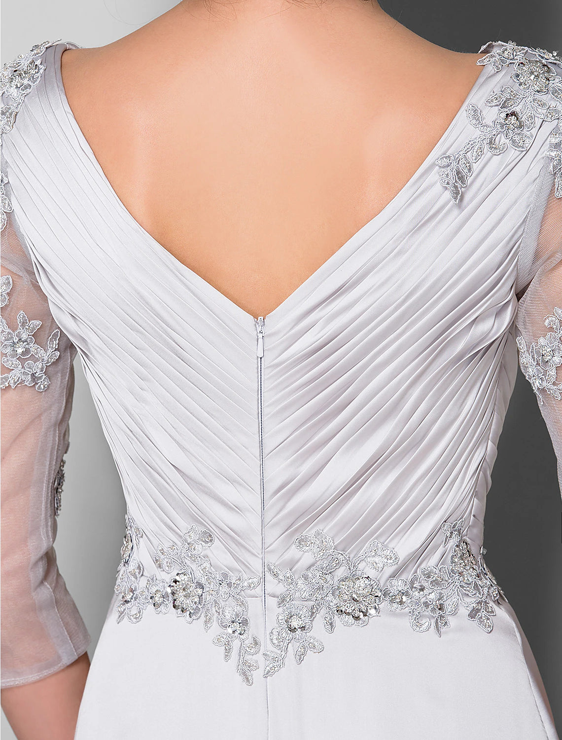 Side profile of the satin chiffon A-line dress, highlighting its graceful silhouette.