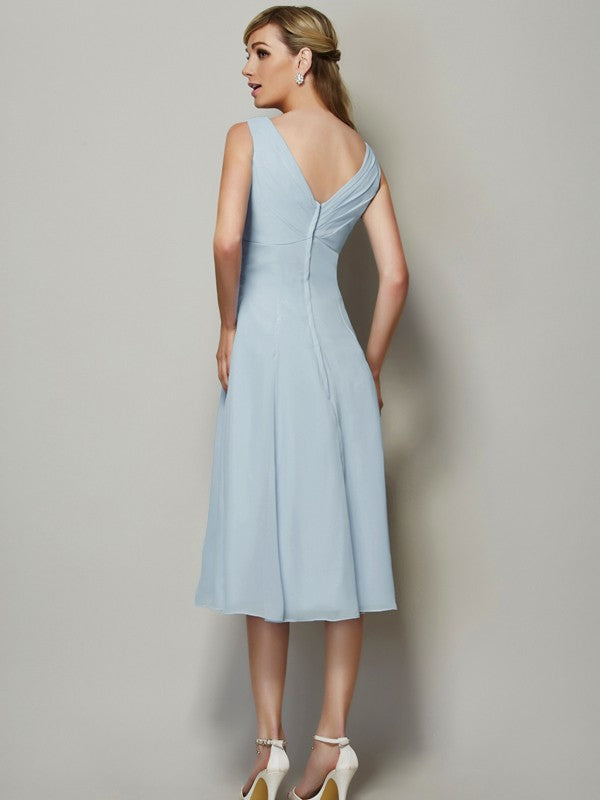 Close-up of the pleated detail on the short chiffon bridesmaid dress.