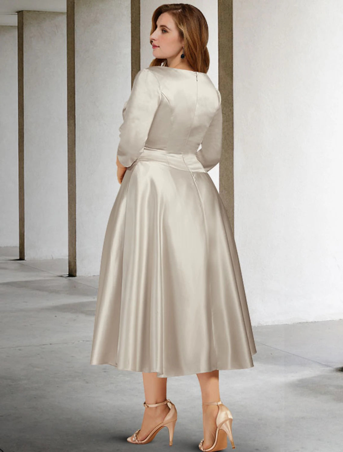 Back view of the A-line V-neck ruched satin tea-length dress.