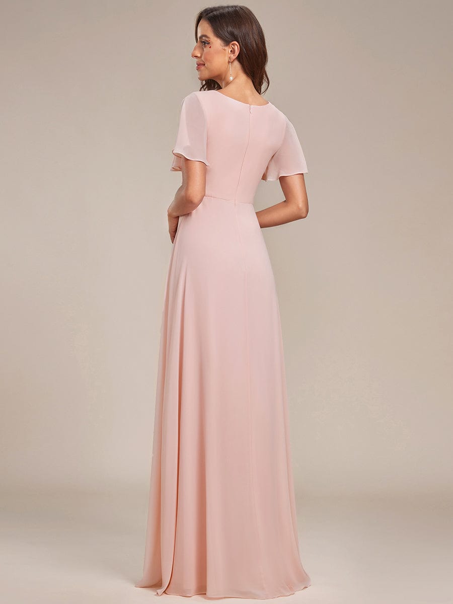 Back view of pink Weitese ruffle sleeve chiffon evening dress.