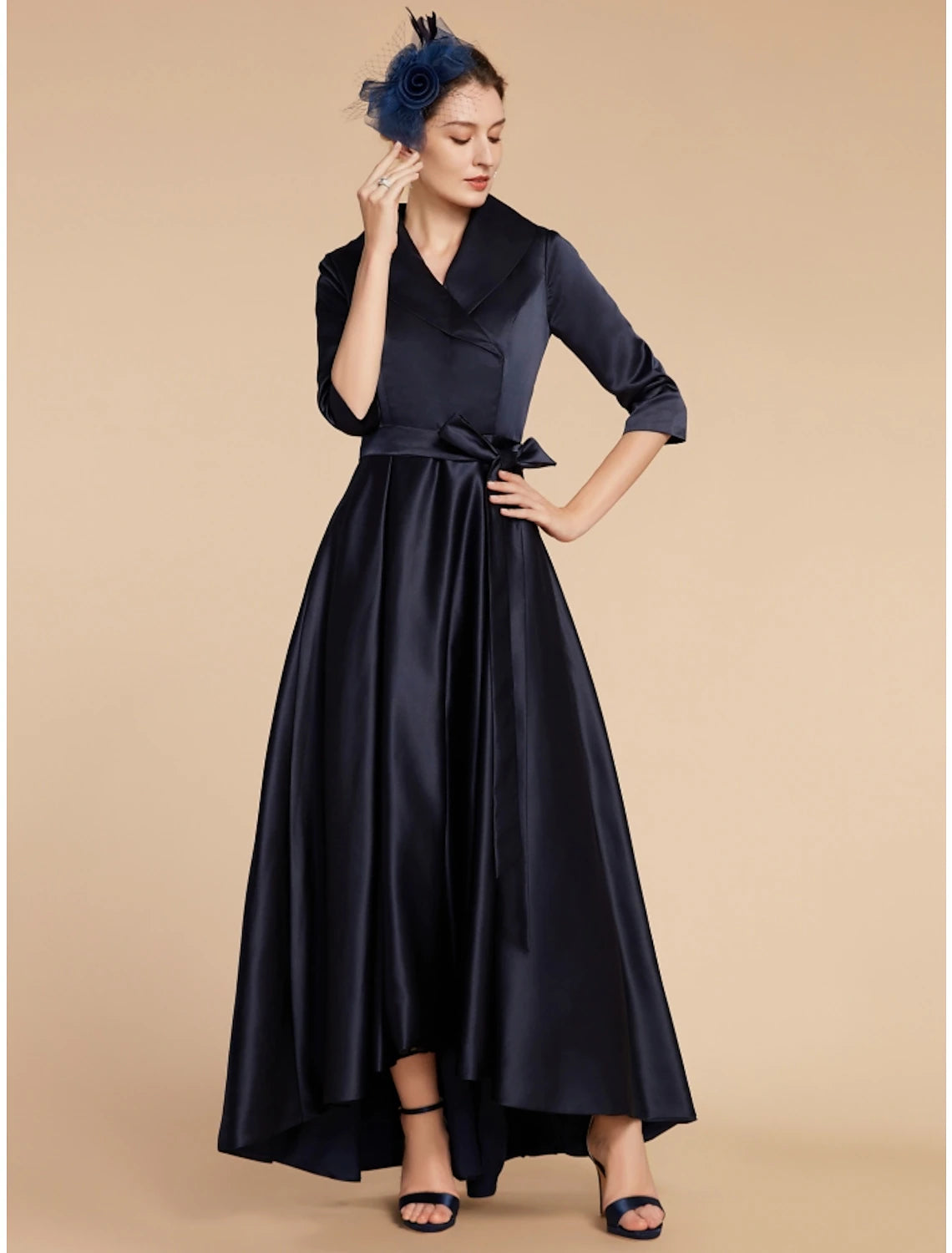 Back view of the elegant ankle-length satin dress with subtle ruching.
