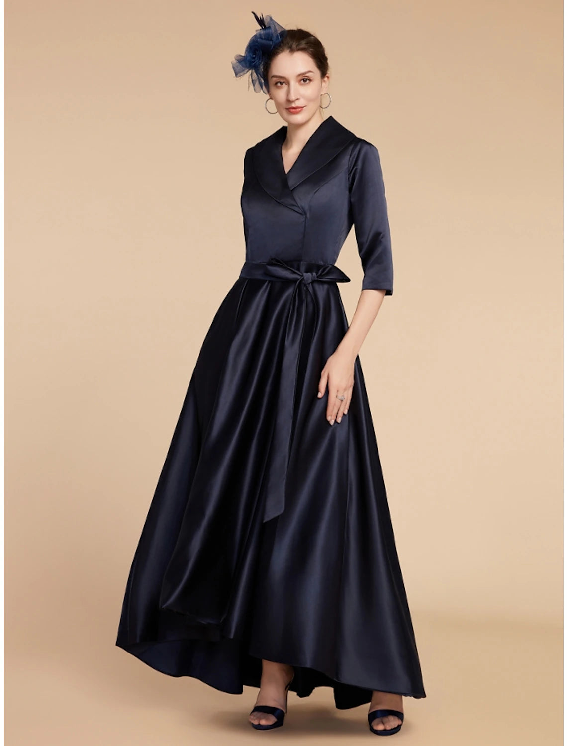 Close-up of the V-neckline and satin fabric of the formal dress.