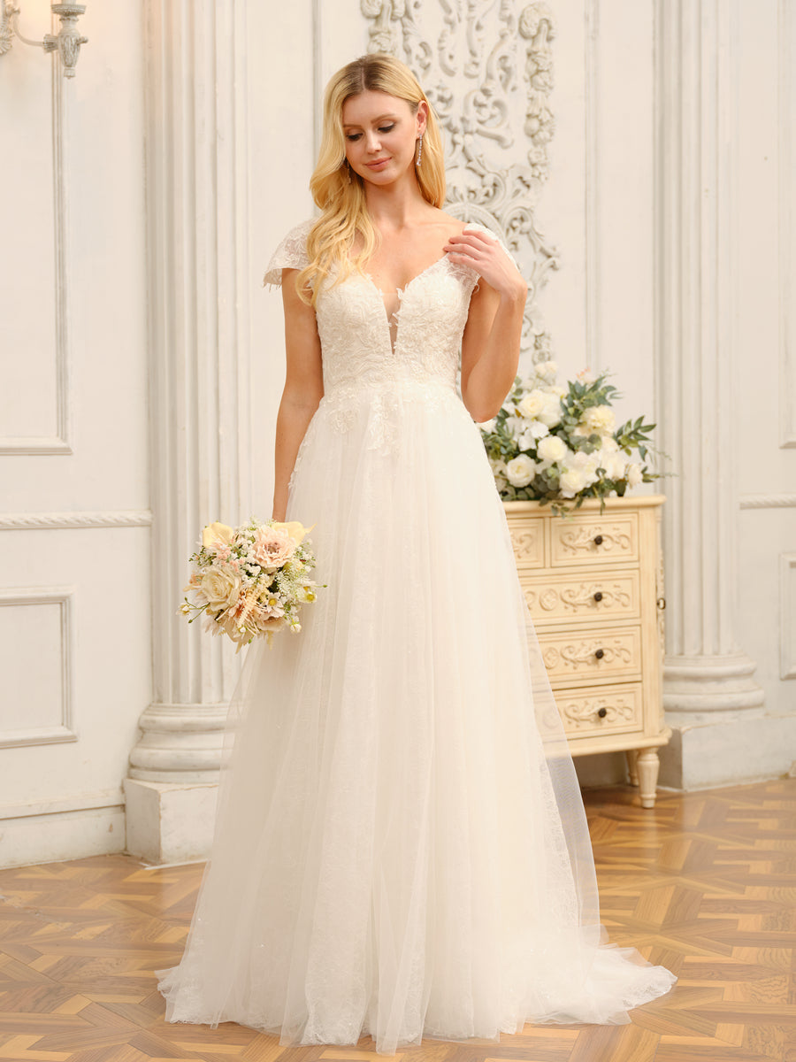 Model wearing a Weitese V-neck short sleeve long wedding dress with appliques.