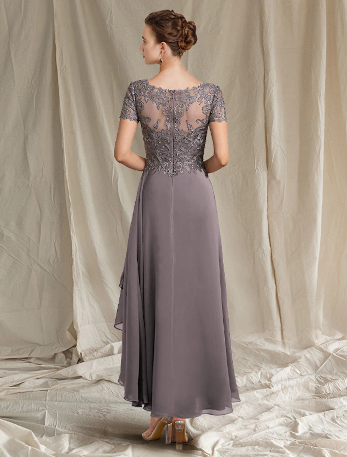 Side view of the A-line V-neck short sleeve chiffon lace high-low tea length dress.