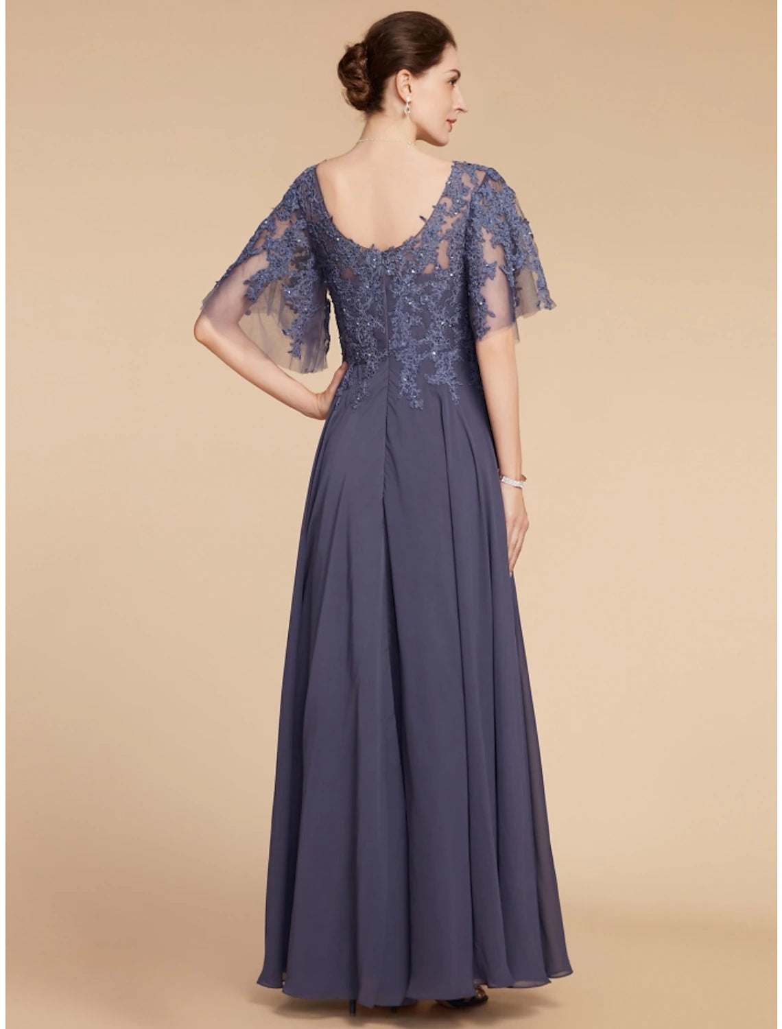 Back view of the A-line floor-length mother of the bride dress.