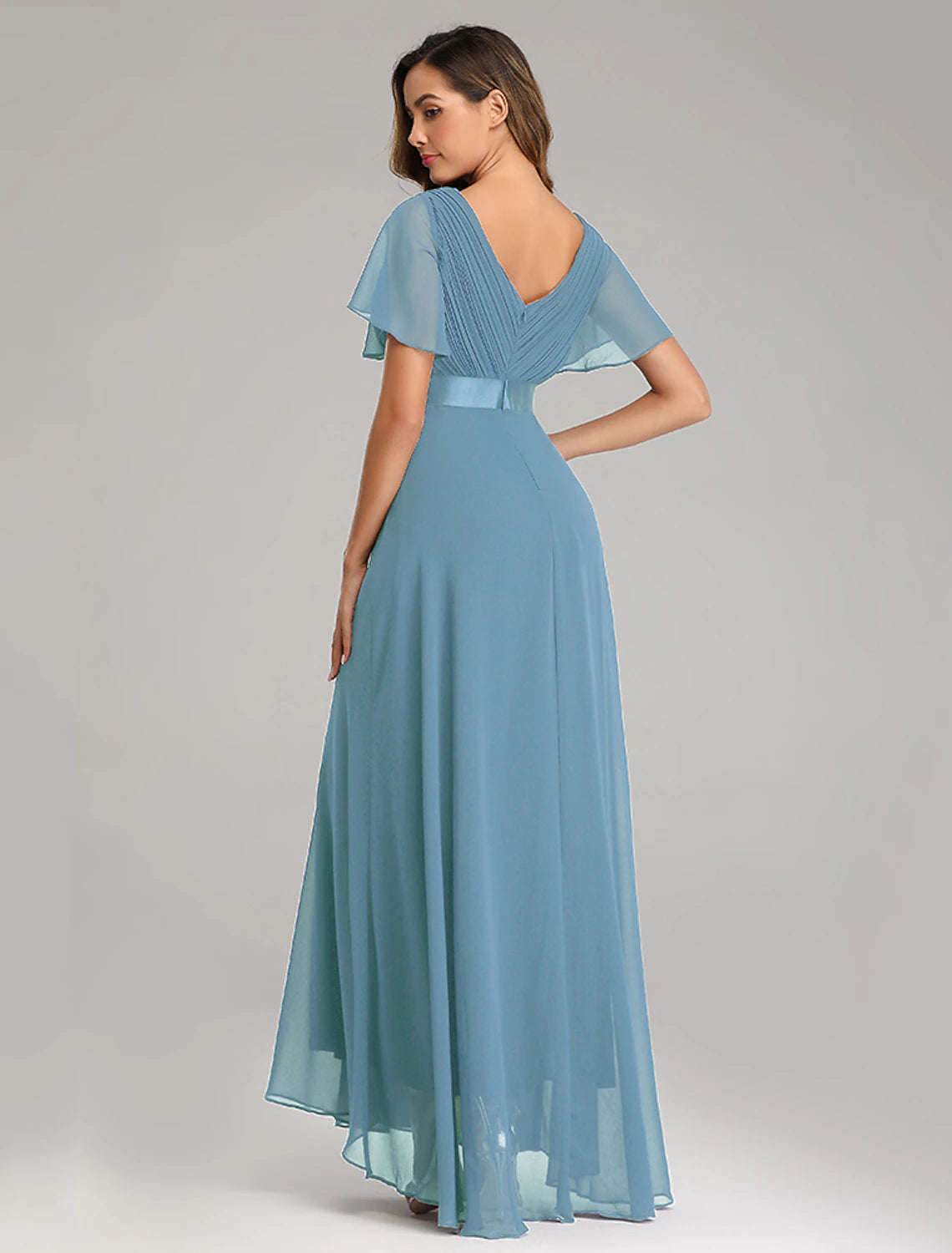 Back view of a red A-line V-neck short sleeve bridesmaid dress, featuring a V-back and ruffled skirt.