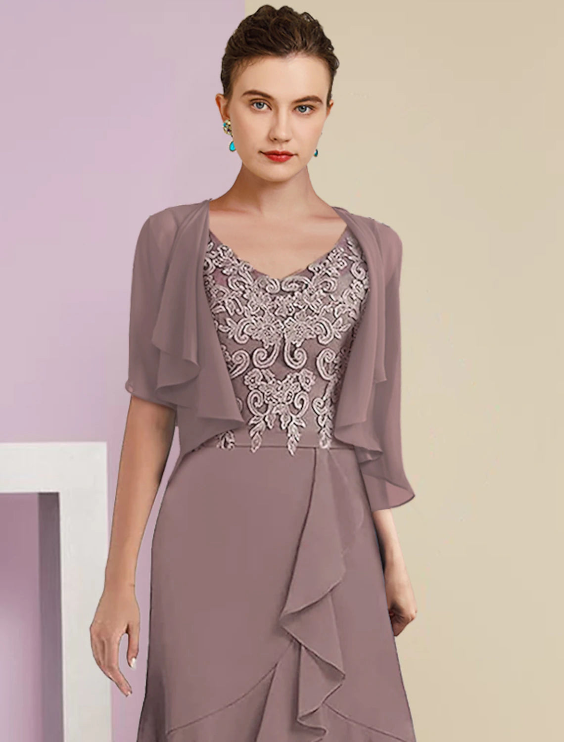 Side profile of model in formal high-low chiffon lace dress.