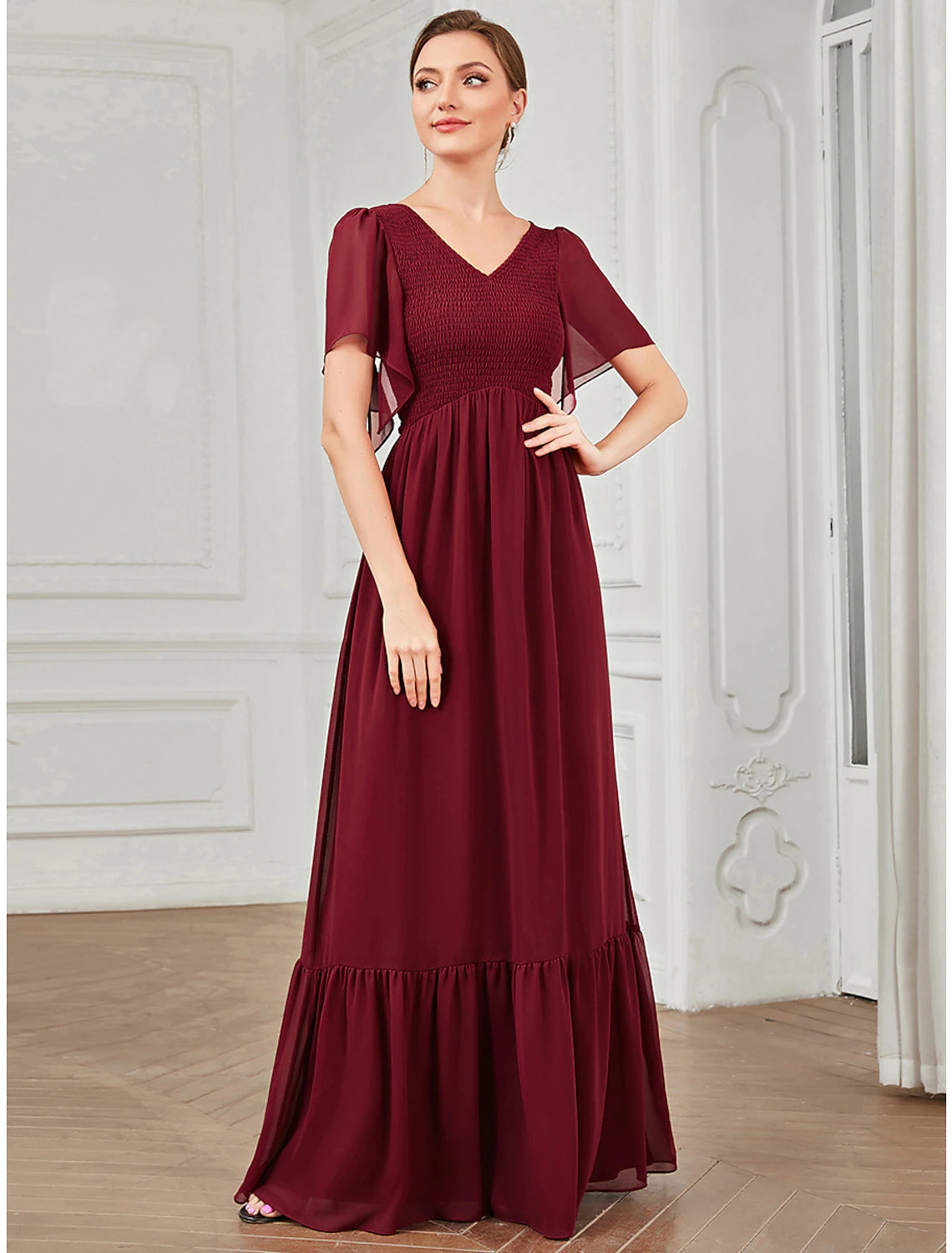 Close-up of the V-neckline and short sleeves of the Weitese chiffon formal dress.