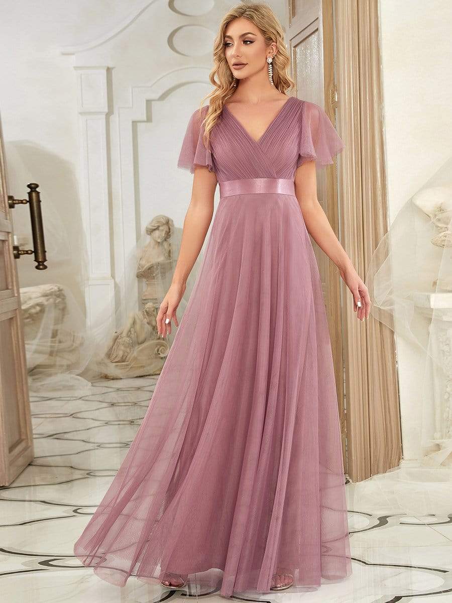 Green V-neck short sleeve tulle floor-length dress.