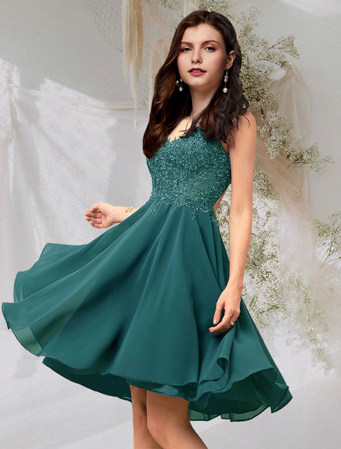 Front view of a Weitese A-Line V-neck sleeveless chiffon cocktail dress with beading and lace inserts.