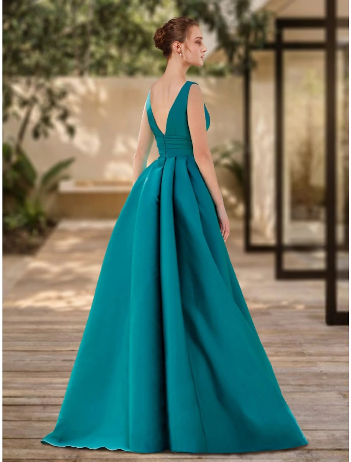 Model wearing a green Weitese A-Line V-Neck sleeveless satin evening gown with ruched details.
