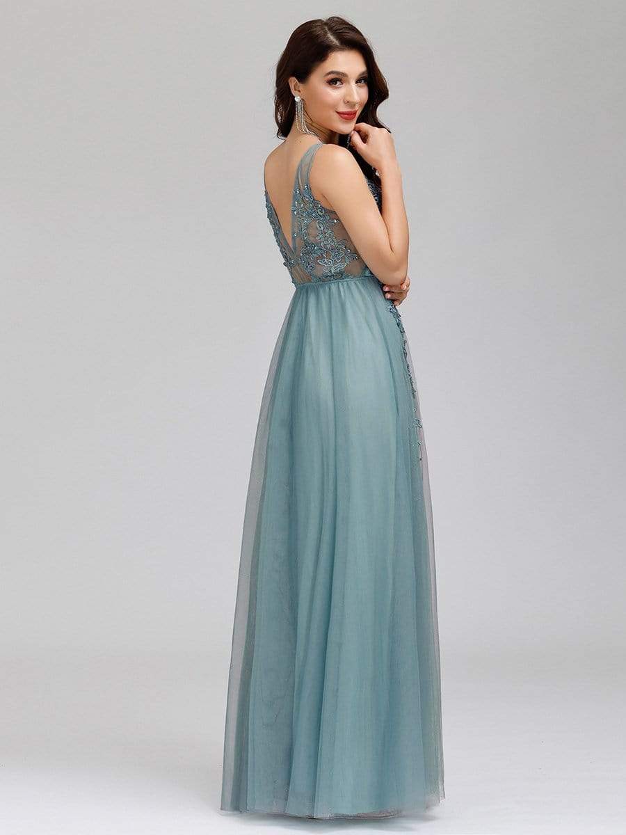 Red tulle maxi dress with flowing skirt.