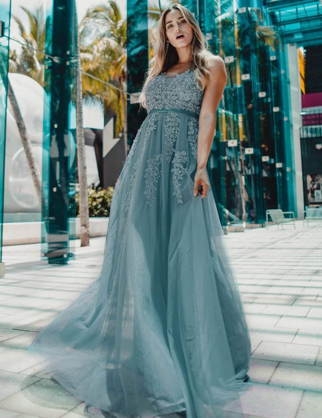 Close-up of dark blue tulle fabric and bodice detail.