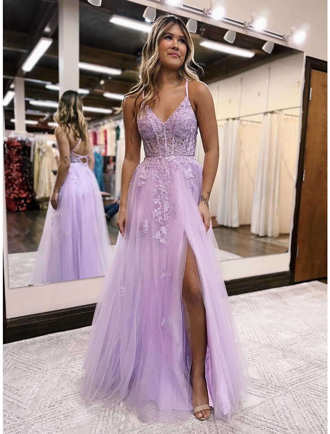 Back view of the A-line V-neck tulle evening gown, showcasing the sophisticated open back design.