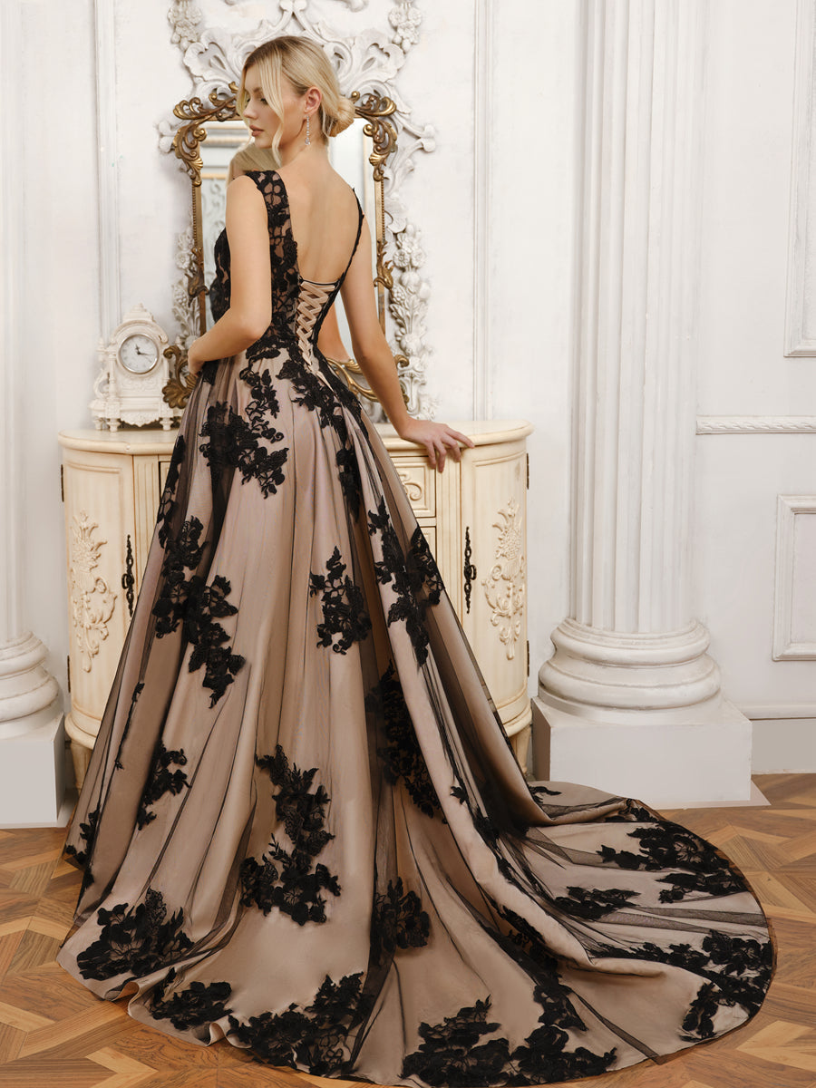 Side view of A-Line tulle wedding dress showing appliques.