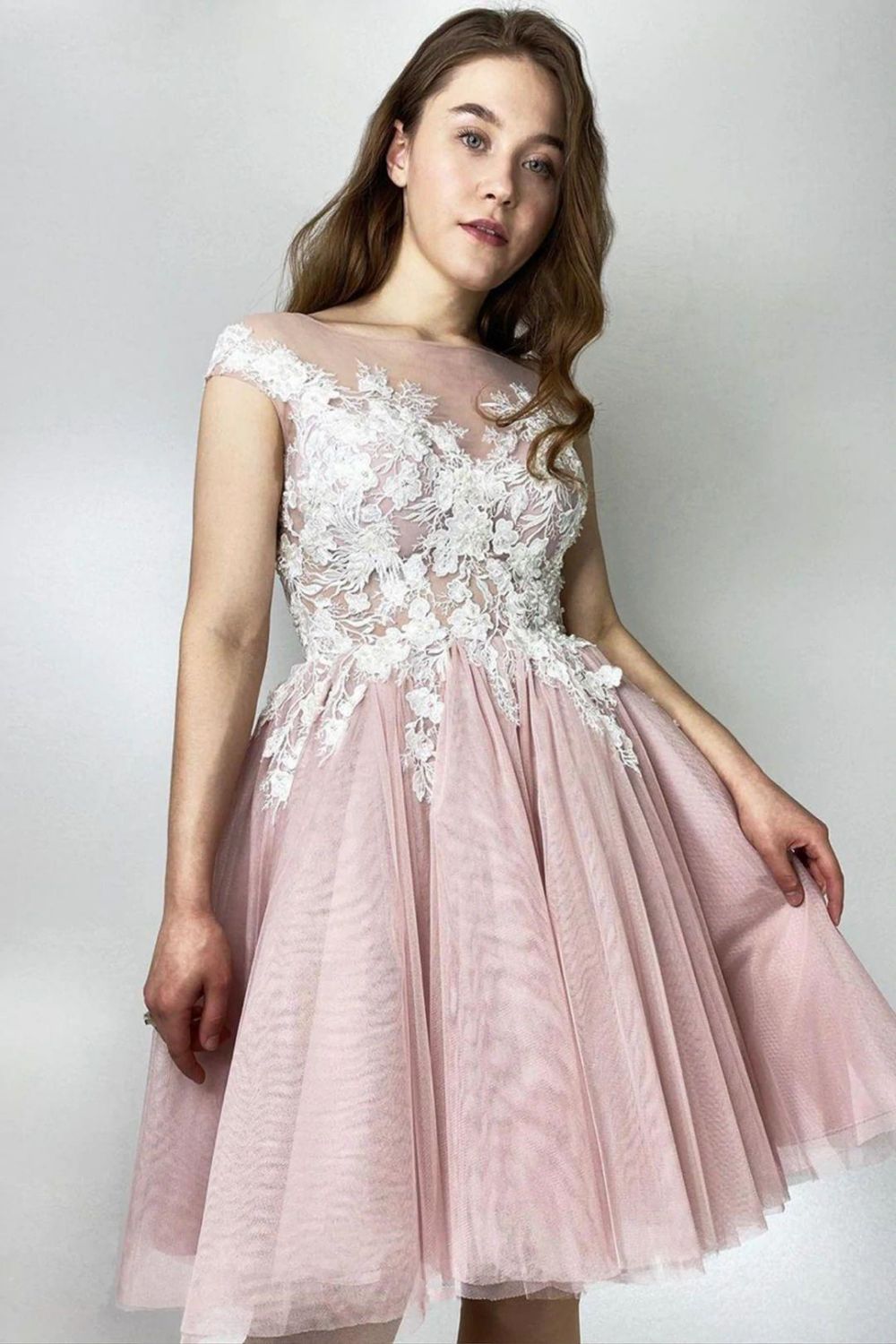Elegant light blue A-line homecoming dress with cap sleeves and intricate applique.