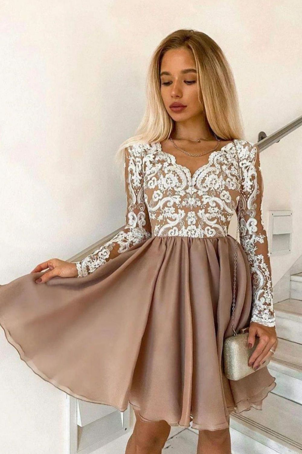 Side view of the Weitese A-line long sleeve knee length dress.