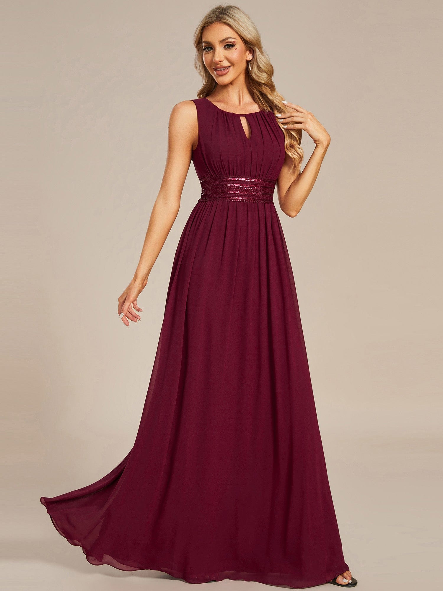 Model wearing a red A-line sleeveless chiffon bridesmaid dress.