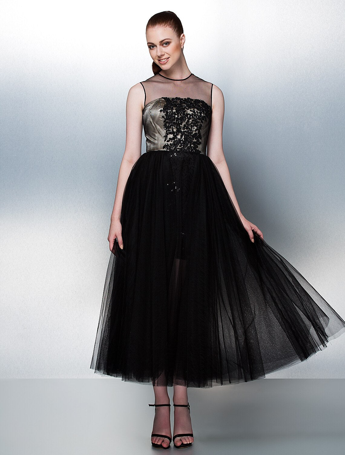Side view of the Weitese tulle tea length prom dress with flowing skirt.