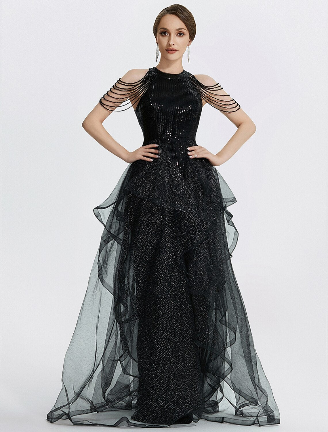 Full view of the black mermaid trumpet dress from a different angle, showcasing its elegant drape.