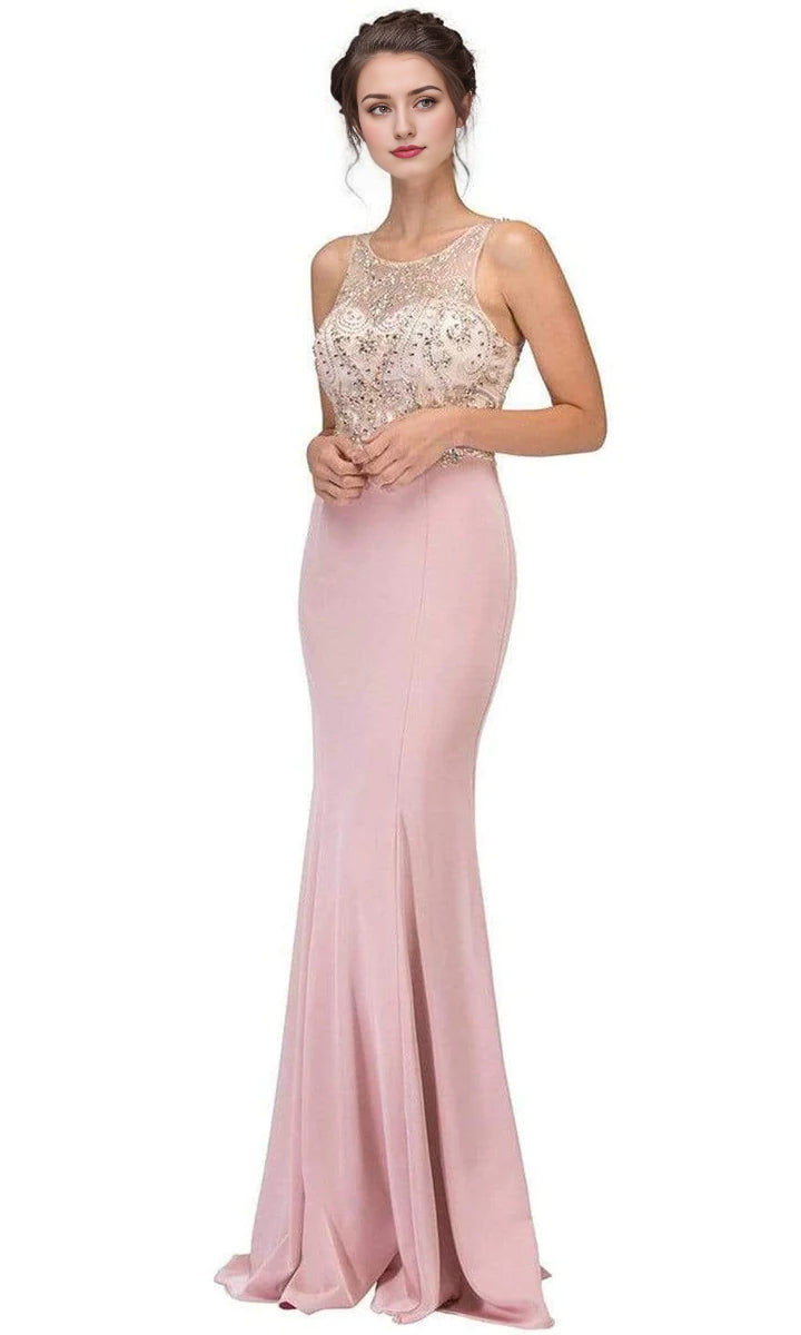 Full-length view of a woman wearing an elegant dark blue beaded illusion scoop mermaid prom dress.