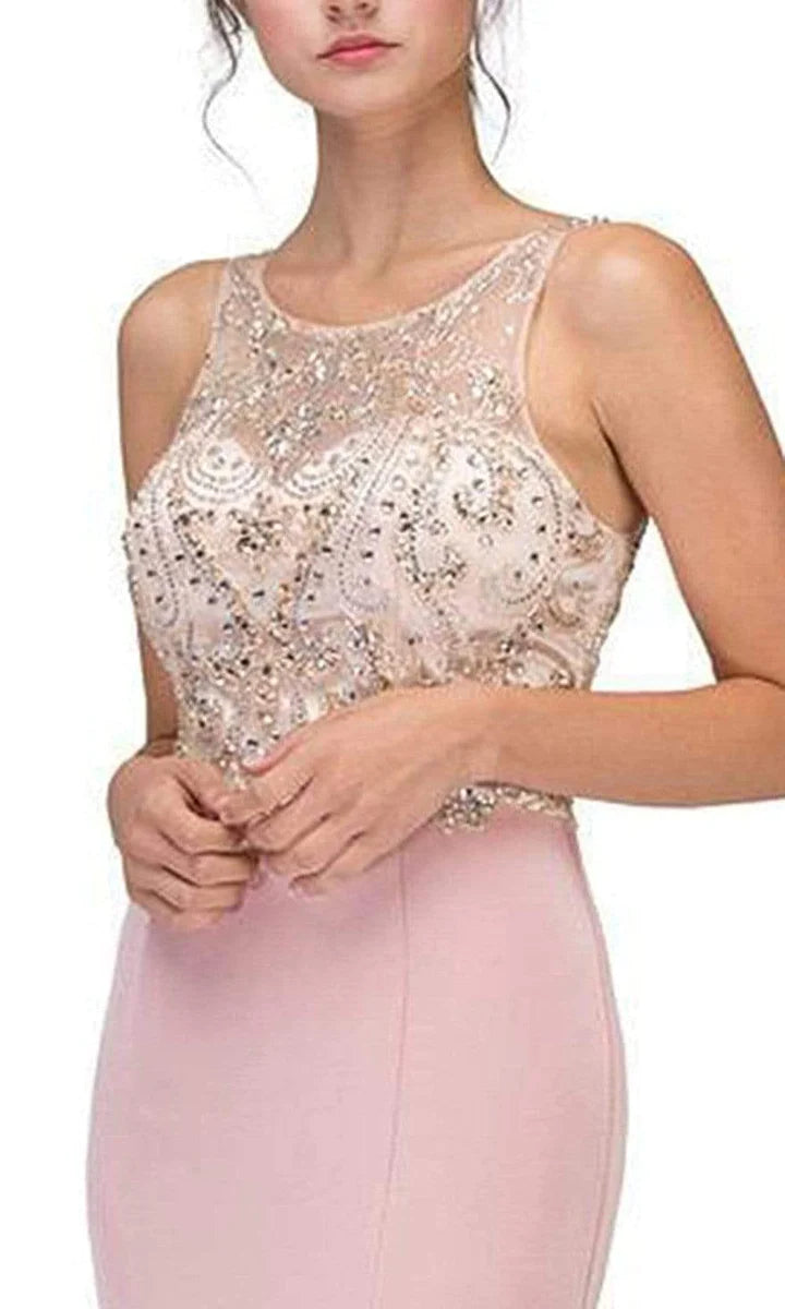Close-up of the intricate beadwork and illusion scoop neckline on a dark blue mermaid dress.