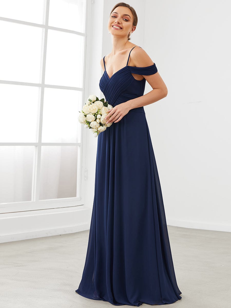 Back view of the navy blue A-line V-neck spaghetti strap bridesmaid dress.