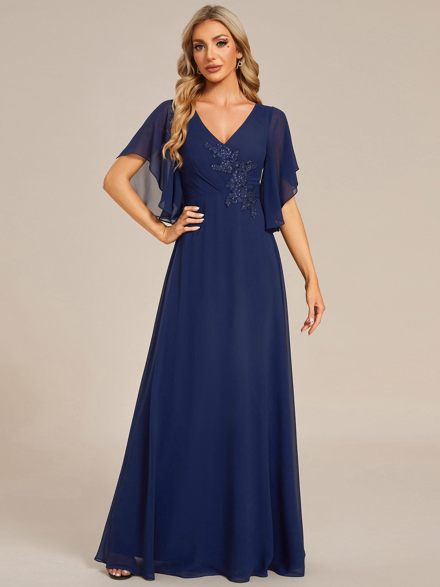 Navy blue chiffon Mother of the Bride dress with half sleeves, perfect for formal events.