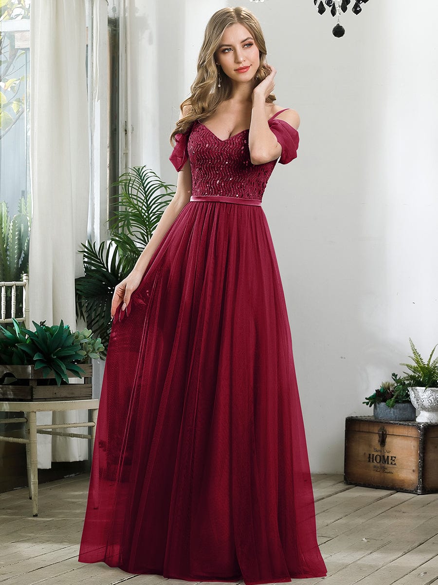 Burgundy cold shoulder sequin bodice long tulle bridesmaid dress.