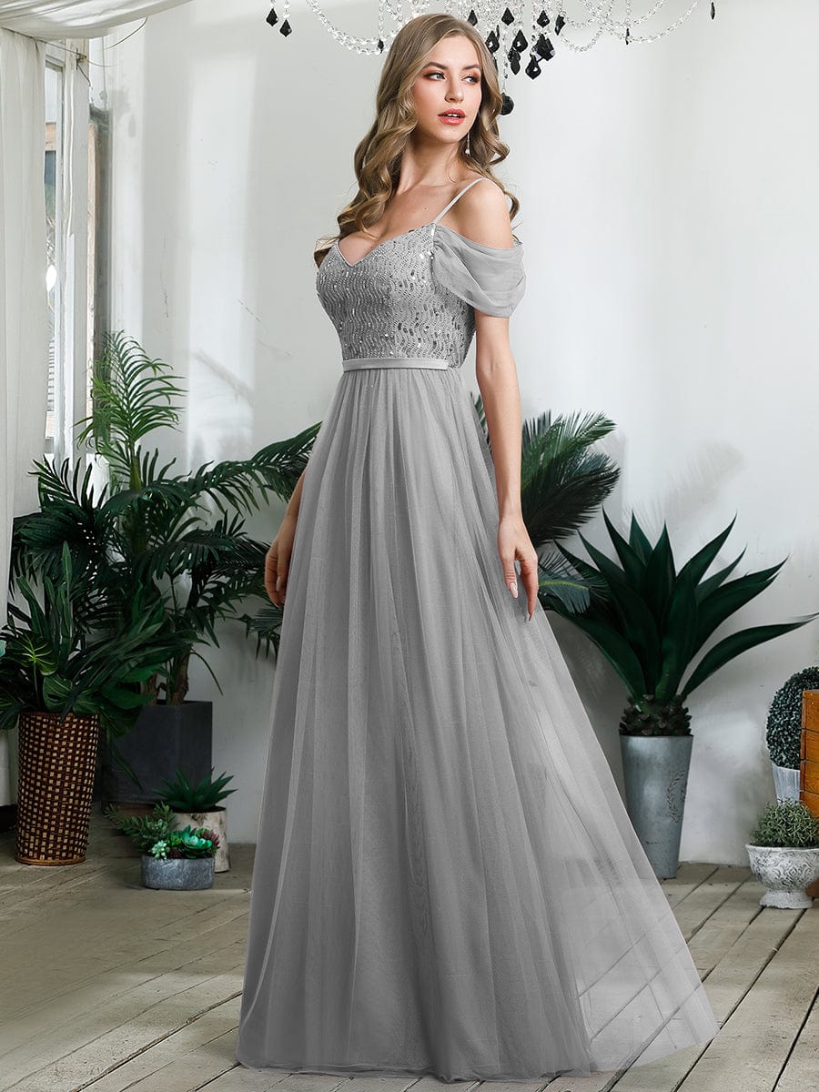 Grey cold shoulder sequin bodice long tulle bridesmaid dress.