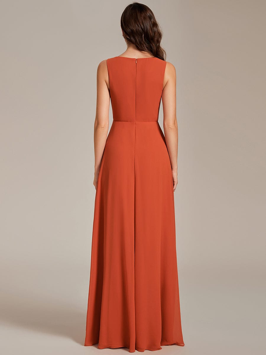 Back view of blue floral applique long formal dress.
