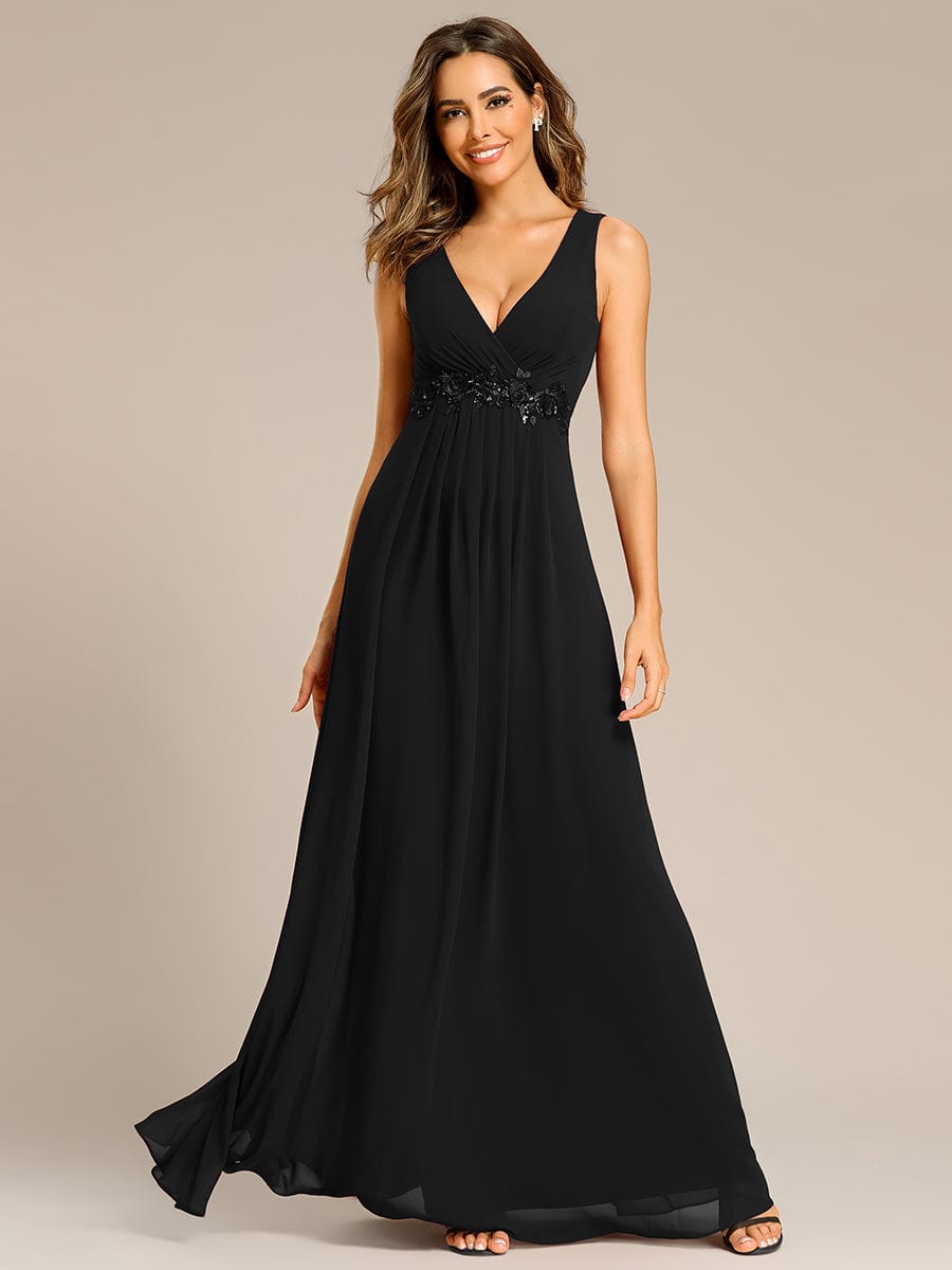 Weitese floral applique chiffon evening dress in black.