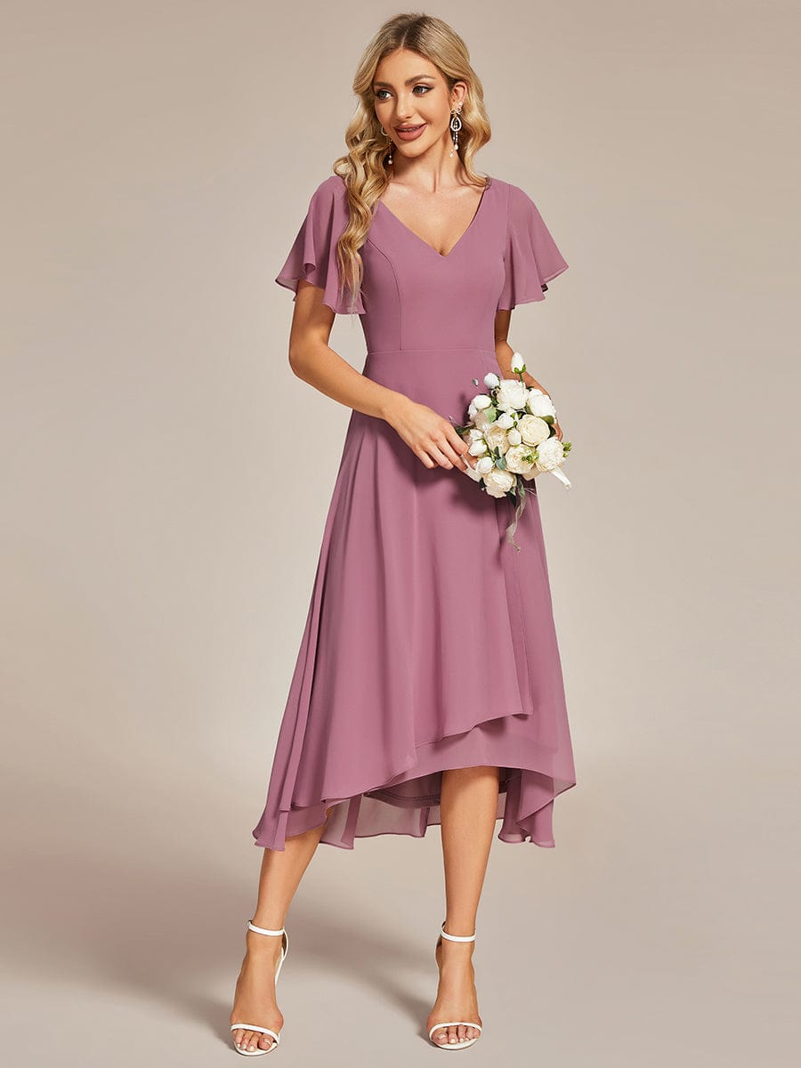 Olive green flowing chiffon V-neck A-line bridesmaid dress with ruffle sleeves.