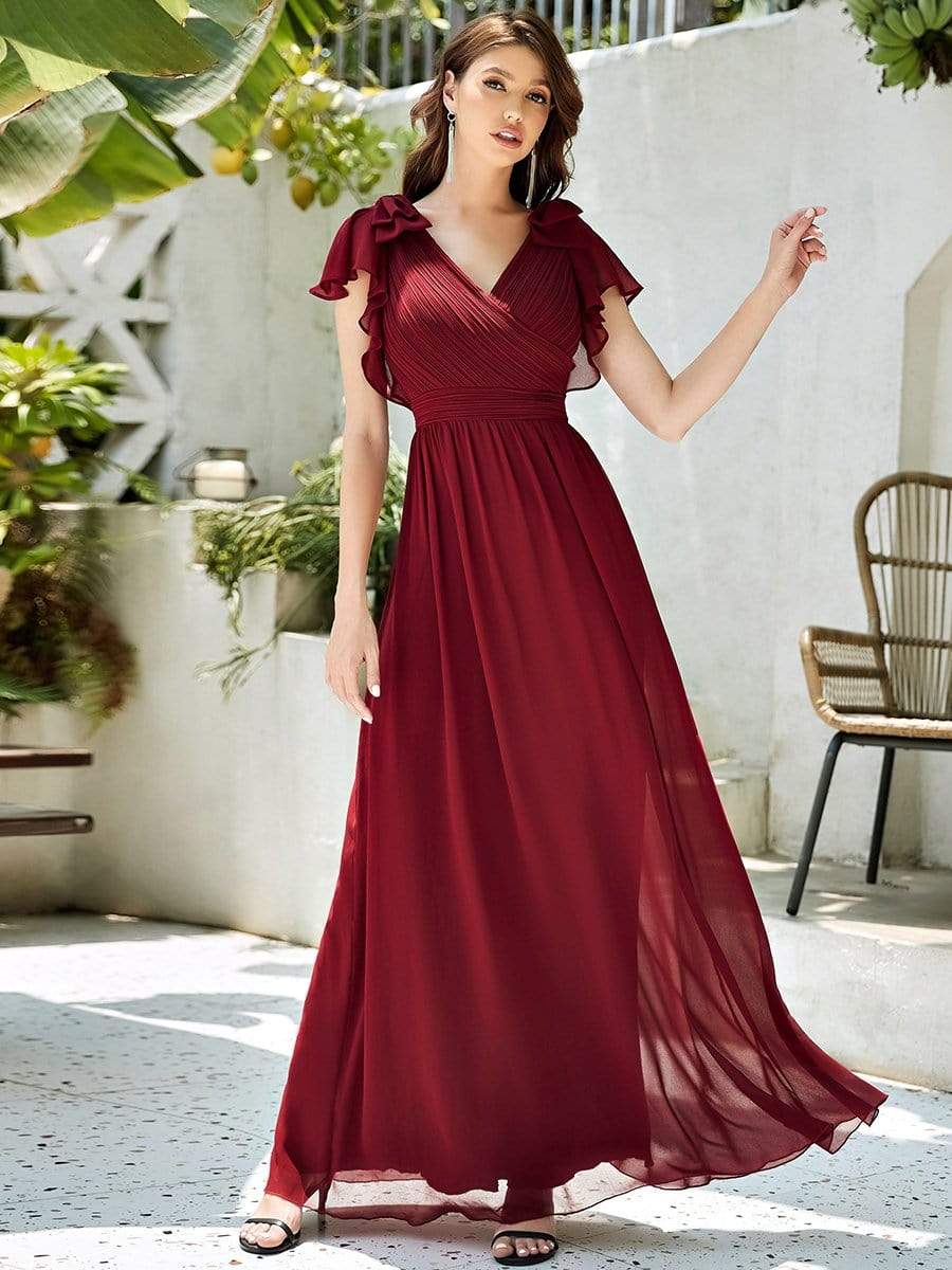 Model wearing a red Weitese elegant pleated chiffon ruffle sleeve evening gown.