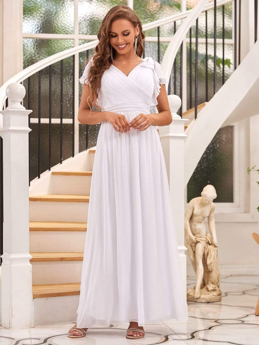 Model wearing a white Weitese elegant pleated chiffon ruffle sleeve evening gown.