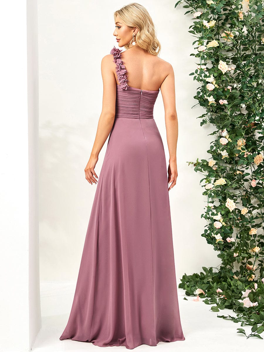 Woman in a vibrant red one-shoulder maxi chiffon formal dress.