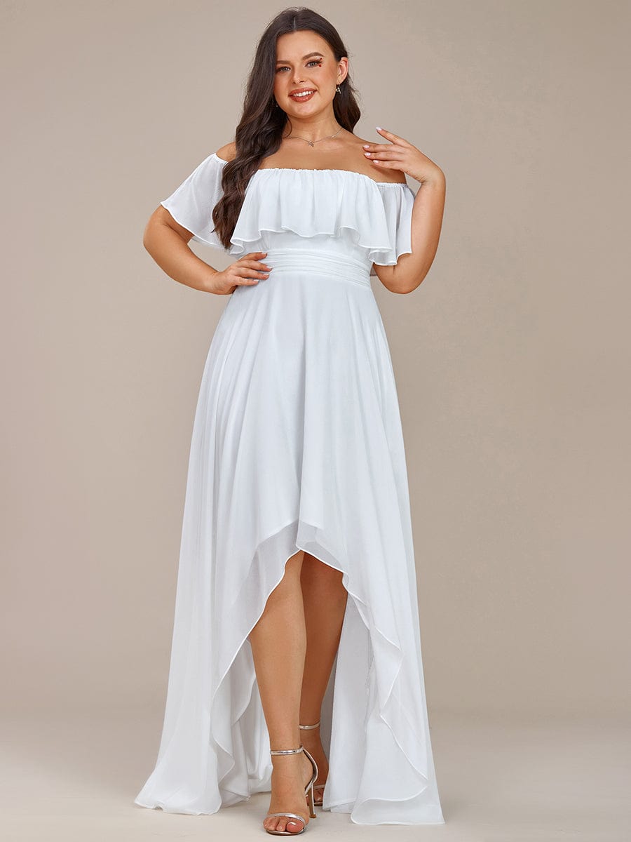 Plus size model wearing a white off-shoulder high-low chiffon bridesmaid dress.