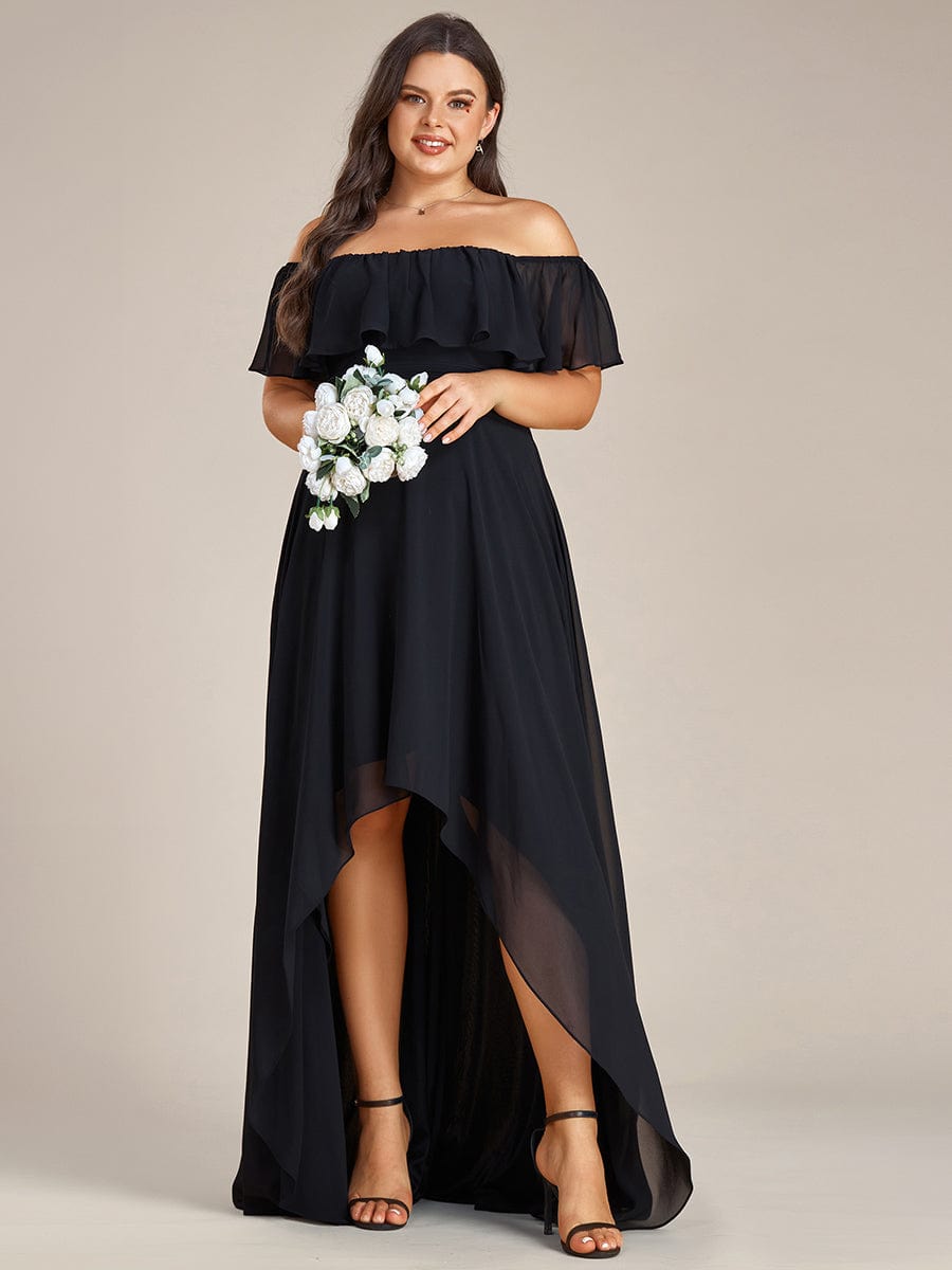 Plus size model wearing a black off-shoulder high-low chiffon bridesmaid dress.
